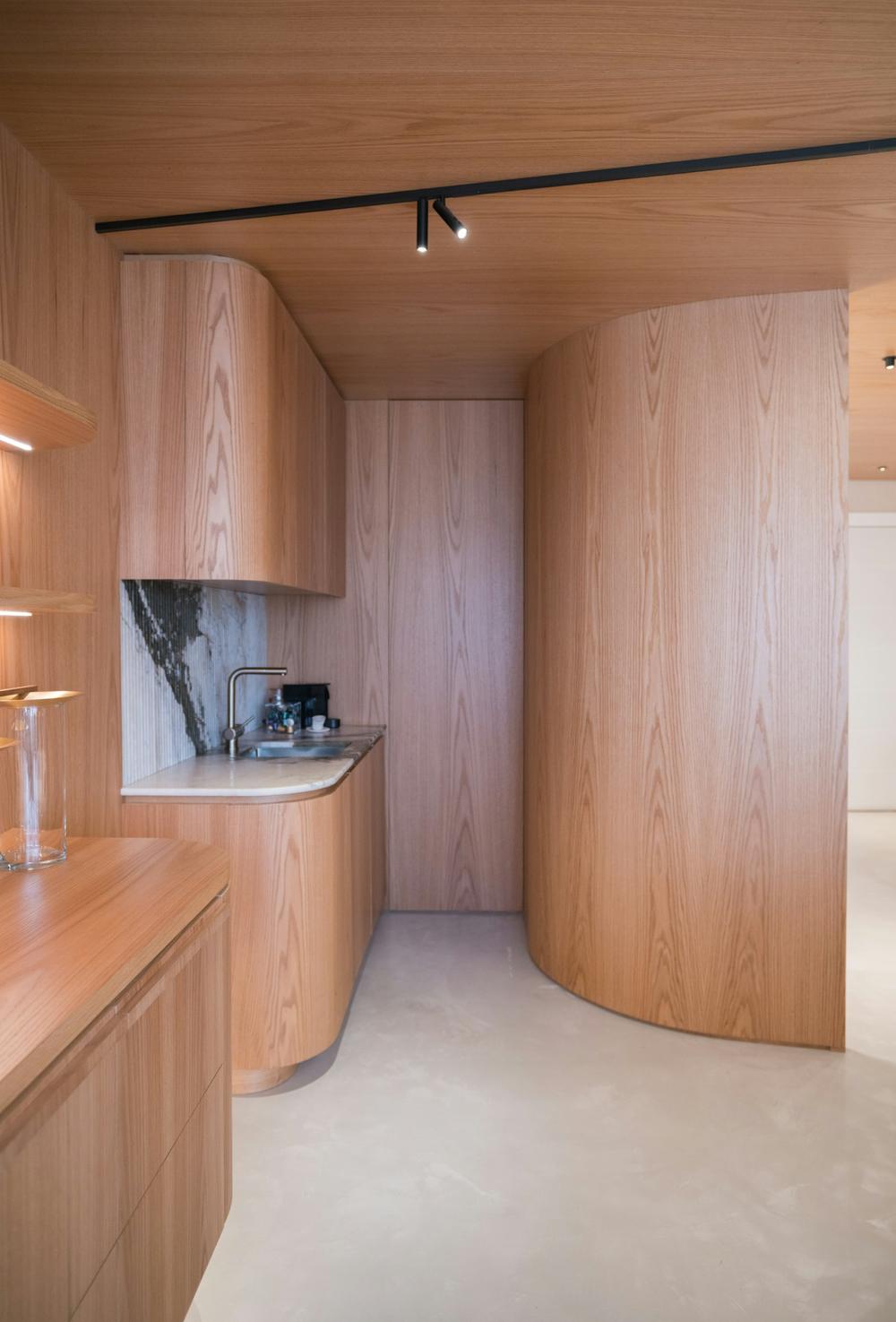 Mar Vista kitchen: Curved white oak, marble backsplash · 9 weeks